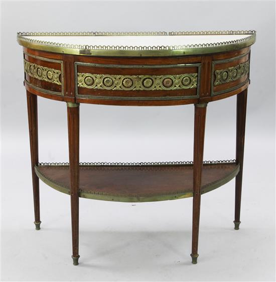 A French brass mounted mahogany demi-lune console table, W.3ft 2in. D.1ft 5in. H.2ft 10in.